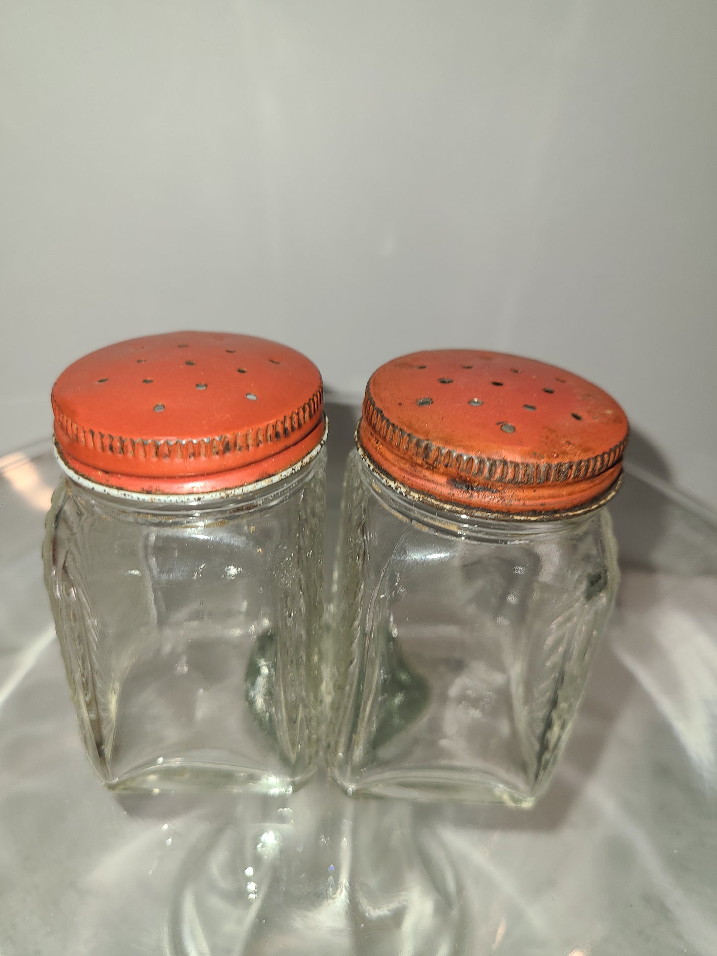 Vintage Glass Salt and Pepper Shakers with red lid