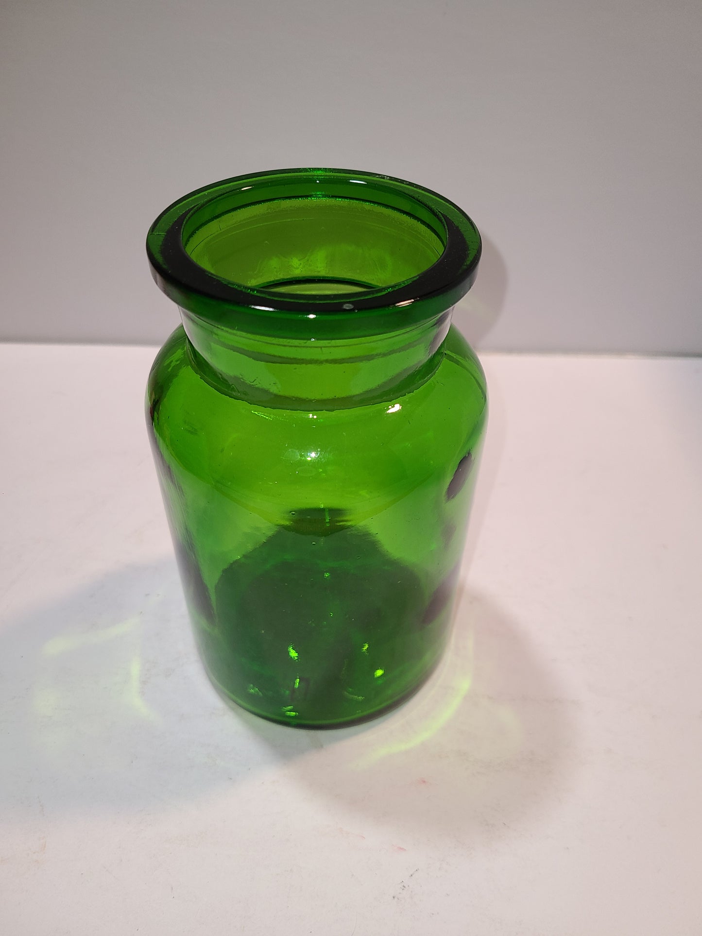 Vintage green glass container